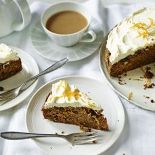 Sugar-free spiced carrot cake with orange cream cheese frosting