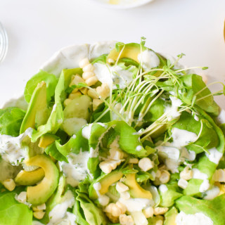 Summer Greens, Avocado, and Corn Salad with Yogurt Herb Dressing