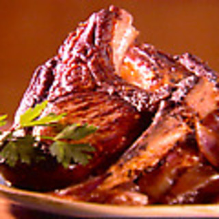 Thick Cut Mustard Marinated Pork Chops with Caramelized Red Onions
