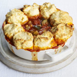 Tomato and harissa stew with cheddar dumplings