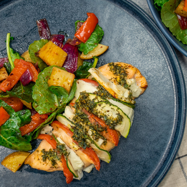 One-Pan Greek Hasselback Chicken with Roasted Chili Crisp Vegetables 