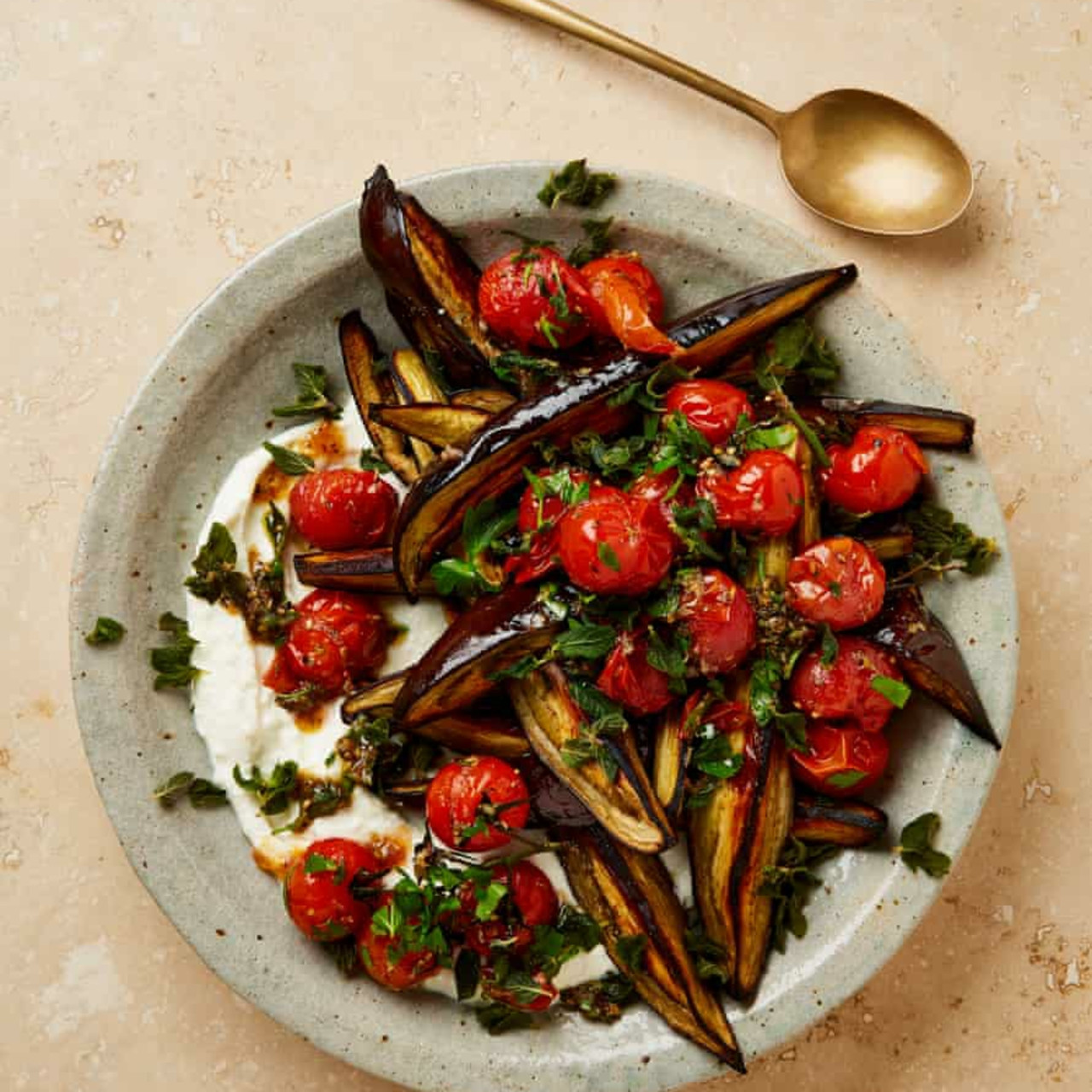 Aubergine and tomato salad with feta cream and oregano