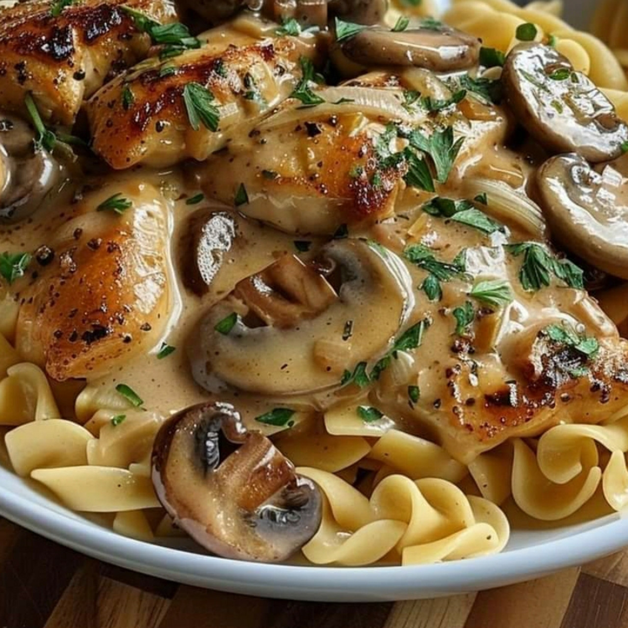 Chicken with Buttered Noodles Tender Chicken Medallions in a Rich Mushroom