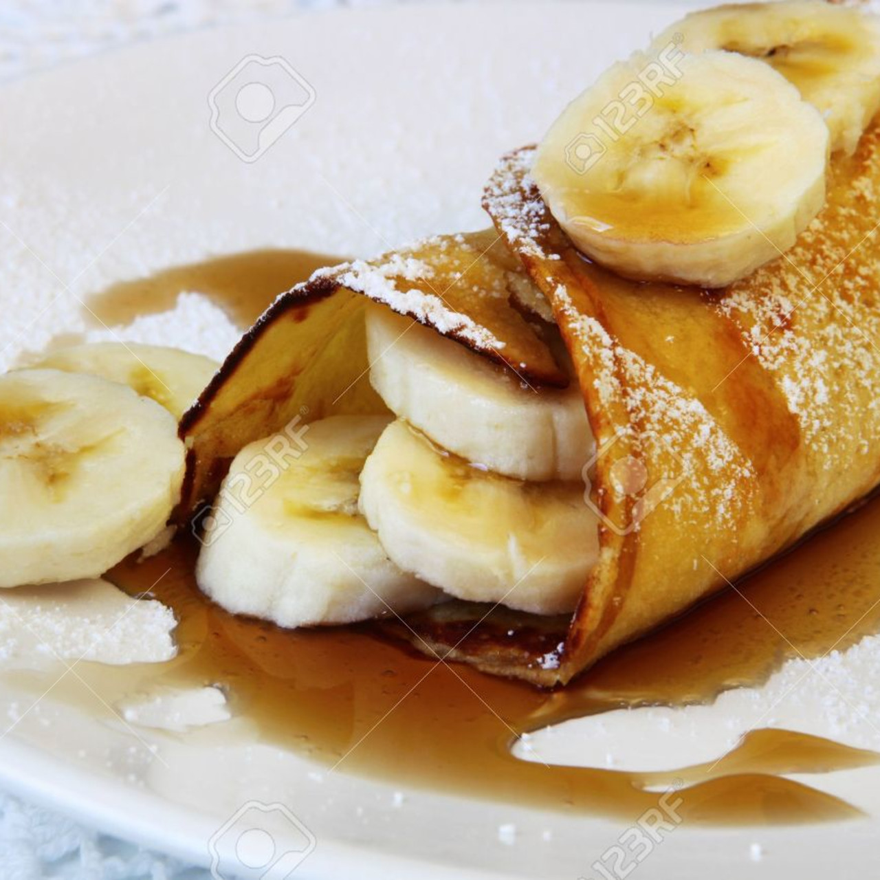Crepe topping sauteed bananas