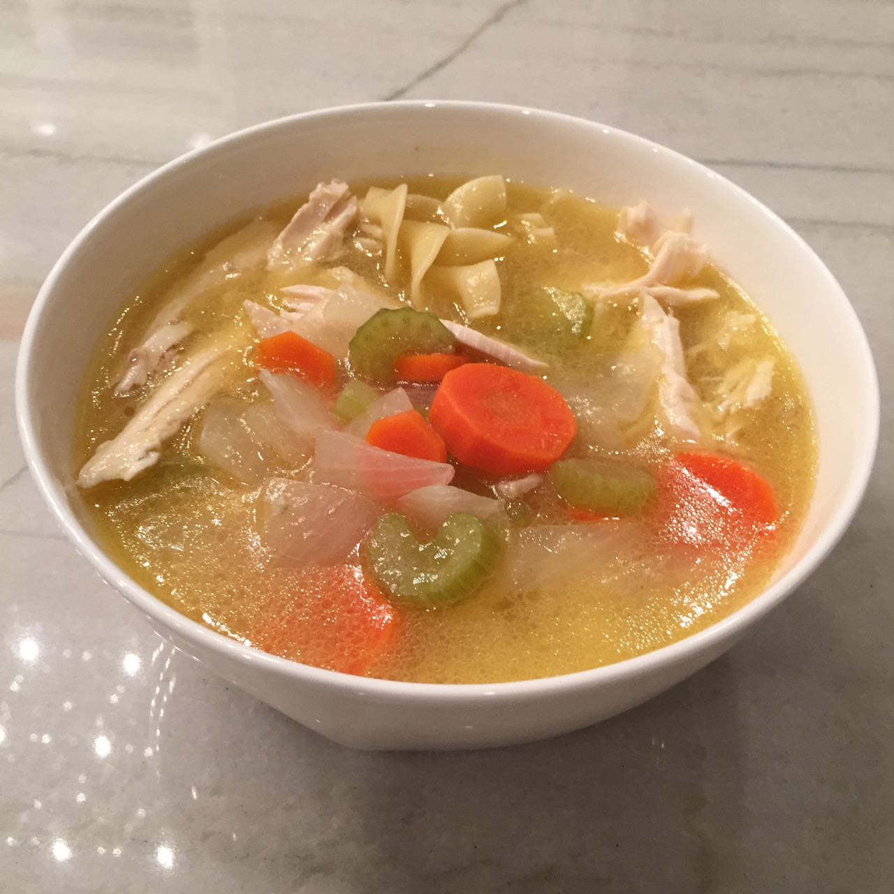 https://bigoven-res.cloudinary.com/image/upload/t_recipe-1280/moms-chicken-noodle-soup-97cca1.jpg