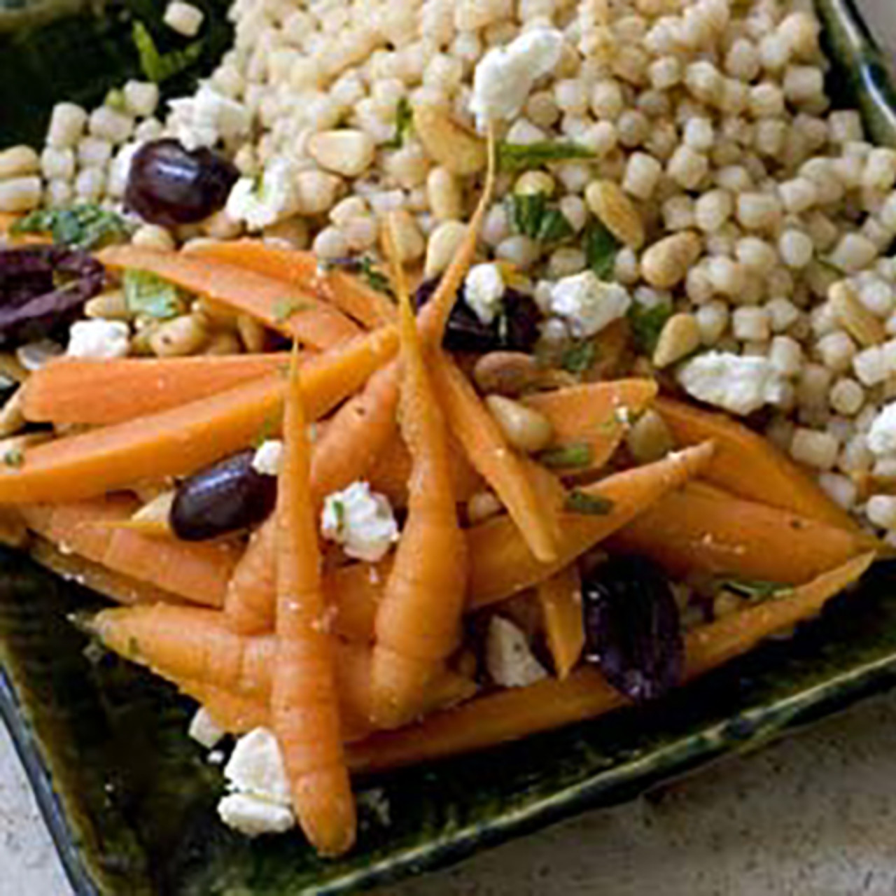 Recipe: Baby carrot tagine with honeyed pine nuts