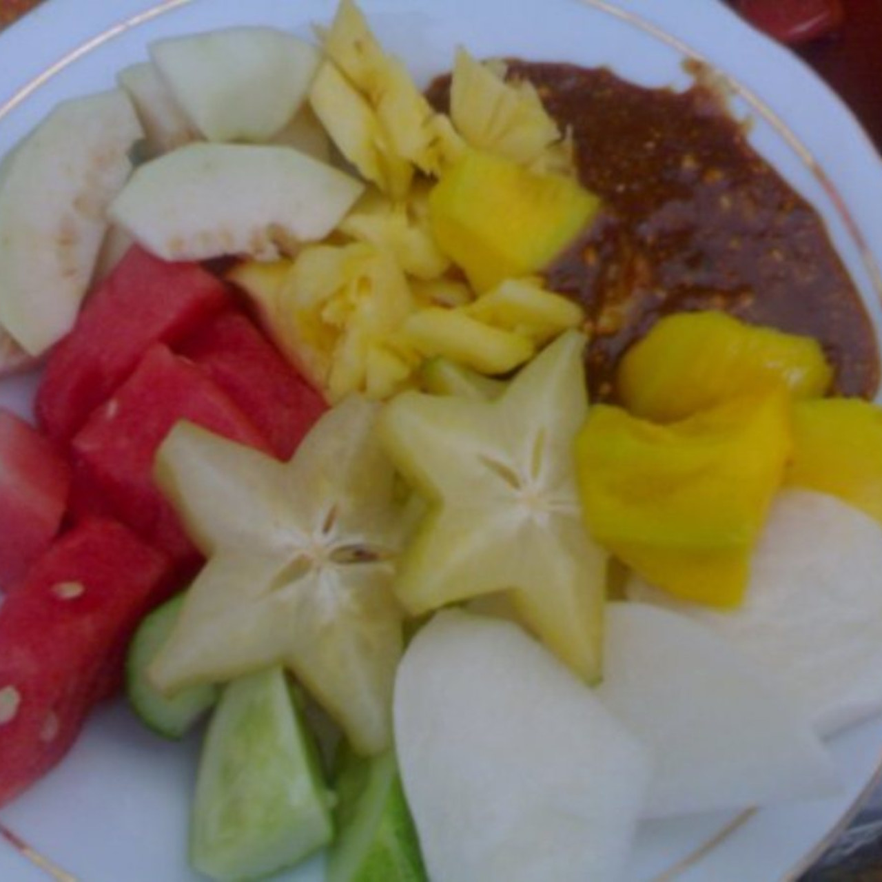 Photo Rujak Buah - Fruit Salad with Spicy Palm Sugar Sauce from Palembang City