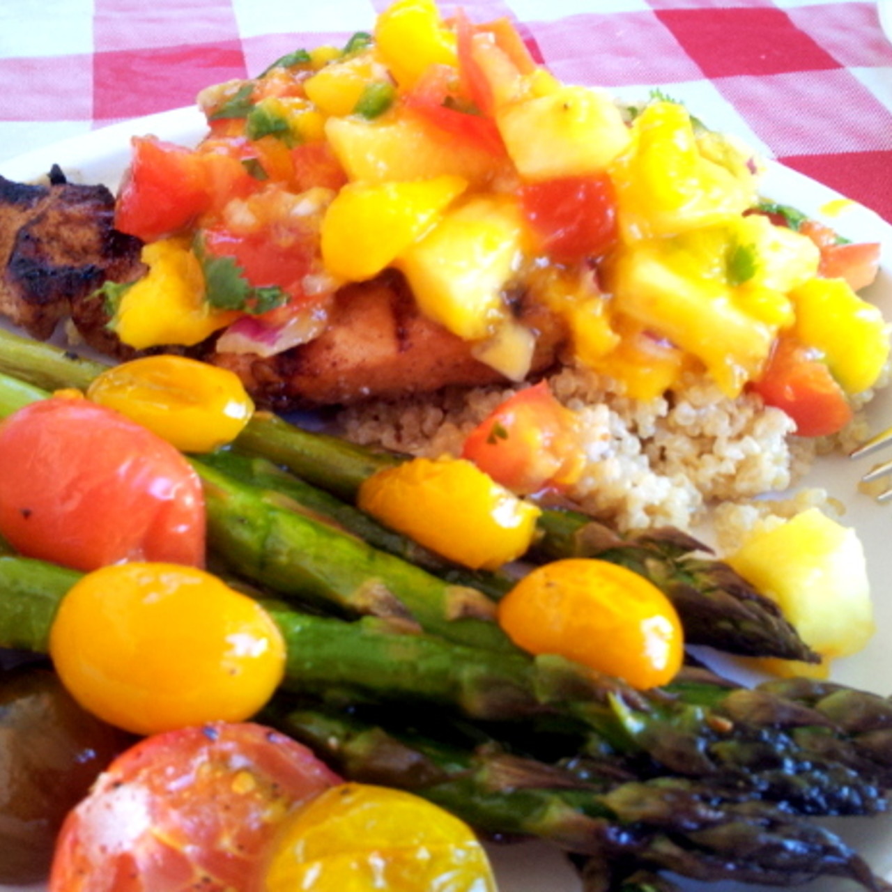 Slightly Jerked chicken w/ Pineapple Mango Salsa served over Coconut Quinoa