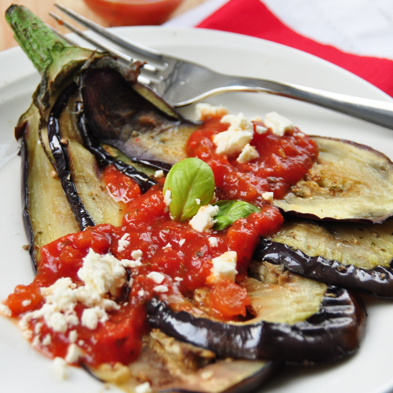 Tomato Stuffed Roasted Eggplant with Feta