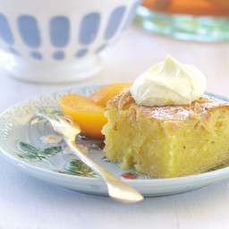 Almond and brandy cake with poached peaches