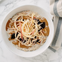 Almond Butter and Jelly Oatmeal Bowl with Spiralized Apples and Toasted Alm