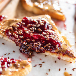 Almond Butter Toasts with Raspberry Preserves & Flaxseeds