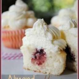 Almond Wedding Cake Cupcakes with Raspberry Filling
