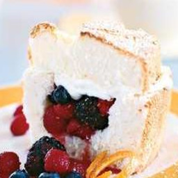 Angel Food Cake Stuffed with Whipped Cream and Berries