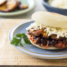 Arepa Filled with Shredded Beef, Black Beans, Fried Plantain & White Cheese