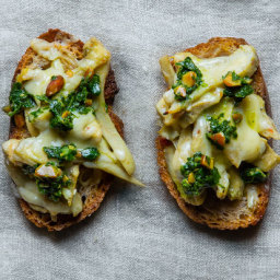 Artichoke Dip Toasts with Spinach Pesto