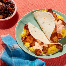 Austin-Style Breakfast Tacos with Cheesy Eggs, Roasted Potatoes & Spicy