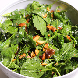 Baby Kale Salad with Dates, Roasted Almonds and a Lemon Parmesan Dressing