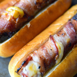 Bacon Wrapped Cheese Stuffed Hot Dogs with Crispy Onions and Jalapenos
