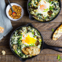 Baked Eggs with Creamy Kale and Chard with Garlic Butter Toasts