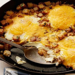 Baked eggs with farmhouse cheddar and potatoes