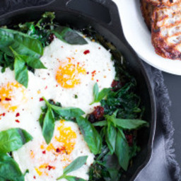 Baked Eggs with Ricotta, Greens, and Sundried Tomatoes