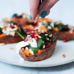 Baked sweet potatoes with spinach and pine nuts