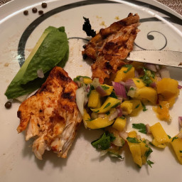 Barbecued chicken taco with mango salsa