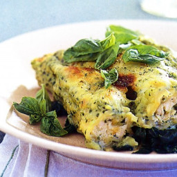 Basil chicken cannelloni on wilted spinach