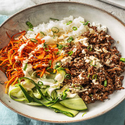 Beef Bulgogi Bowls with Carrots, Cucumber, and Sriracha Crema over Jasmine 