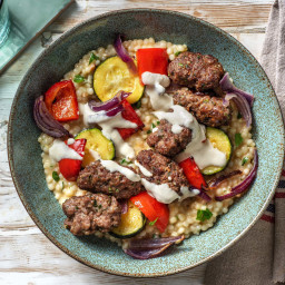 Beef Kofta Tray Bake with Couscous and Lemony Hummus Drizzle