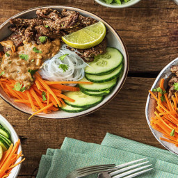 Beef Rice Noodle Bowls with Carrots, Cucumbers, and Peanut Sauce