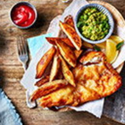 Beer-battered fish with mushy peas