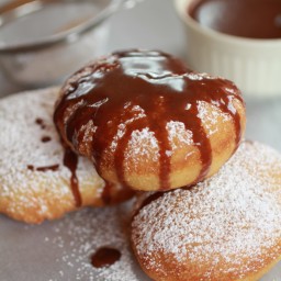 Beignets….filled with chocolate and then drizzled with Chocolate Sauce