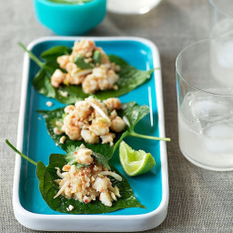 Betel leaves topped with prawns and galangal