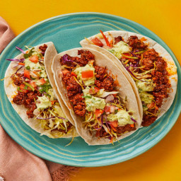 Bold ‘n’ Beefy Tacos with Tangy Slaw, Pico, & Guacamole Cream