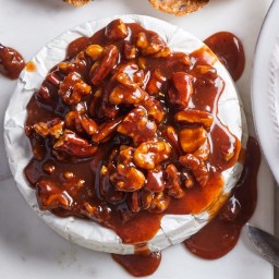 Brie Cheese with Spiced Nuts and Caramel Sauce