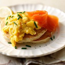 Buckwheat blinis with scrambled eggs and smoked salmon