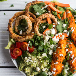 Buffalo Chicken and Crunchy Baked Onion Ring Salad with Blue Cheese.