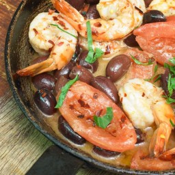 Buttered prawns with tomato, olives and Arak