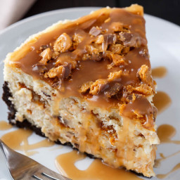 Butterfinger Cheesecake with Caramel Drizzle