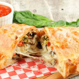 Calzone with Broccoli, Red Peppers, and Mushroomswith marinara dipping sauc