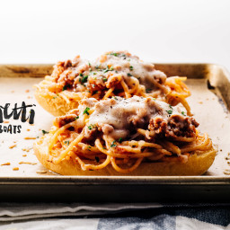 Carbs on Carbs: Cheesy Spaghetti Bolognese on Crispy Garlic Bread Boats