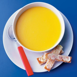Carrot and cheddar soup with toast soldiers