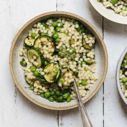 Charred zucchini salad with pearl couscous, preserved lemons and peas