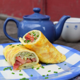 Cheesy omelette wraps with bacon, lettuce, avocado and tomato