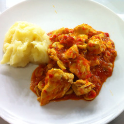 Chicken braised with red peppers
