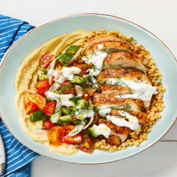 Chicken Gyro Couscous Bowls with Hummus, Tomato-Cucumber Salad, and Creamy 