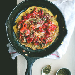 chickpea skillet cake with za'atar, caramelized onions, and roasted red pep