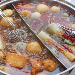 chinese-style-hot-pot-with-rich-broth-shrimp-balls-and-dipping-sauces...-2134340.jpg